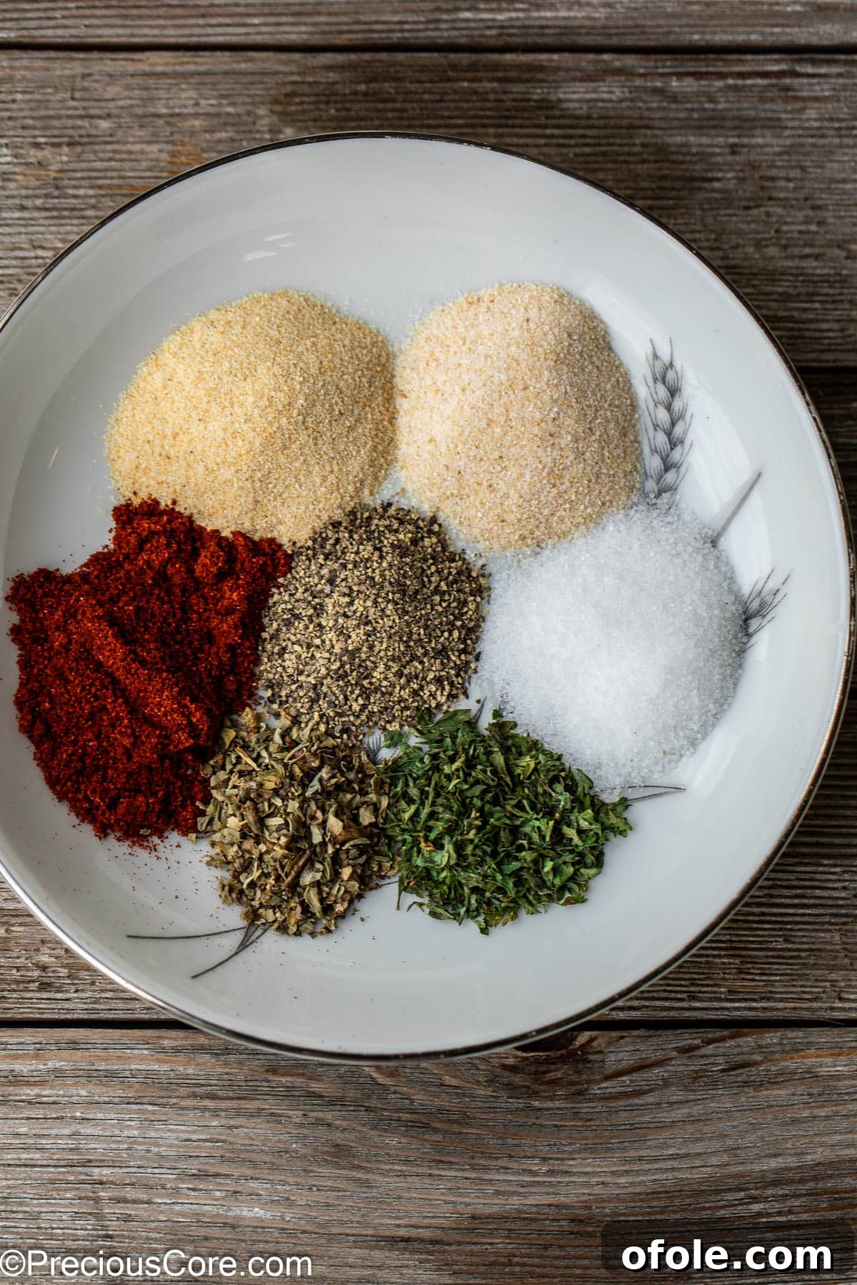 Various spices on a plate.