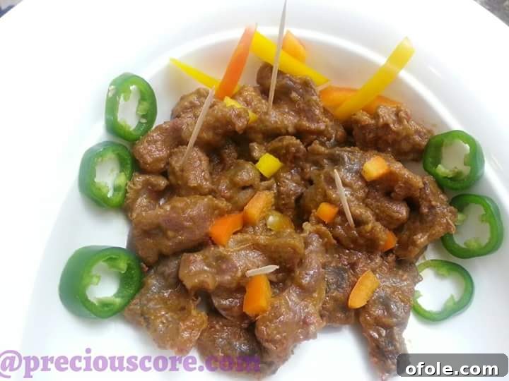 Flavorful Peppered Gizzard Delight 3 Preparing fresh chicken gizzards for cooking