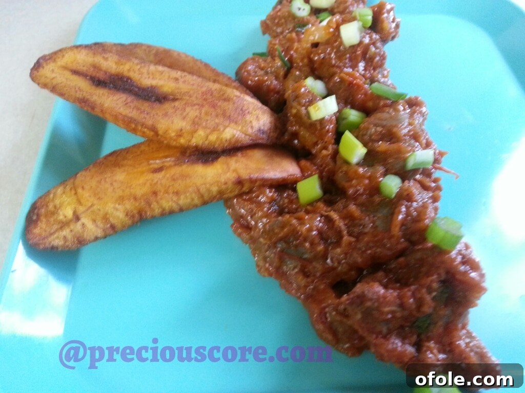 Flavorful Peppered Gizzard Delight 10 Peppered gizzards served with fried plantains