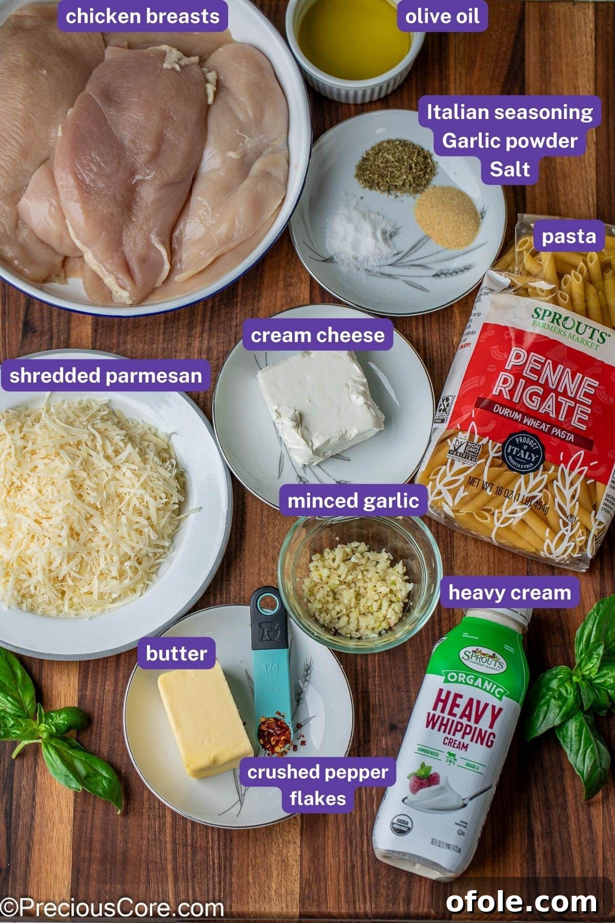 Parmesan Chicken Pasta with Garlic Cream Sauce 4 All the fresh ingredients for creamy parmesan chicken pasta laid out and labeled for easy identification.