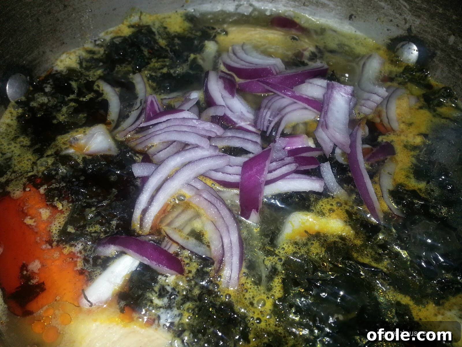 A Taste of Cameroon: Born House Plantain Recipe 11 Adding Chopped Onion to Born House Planti
