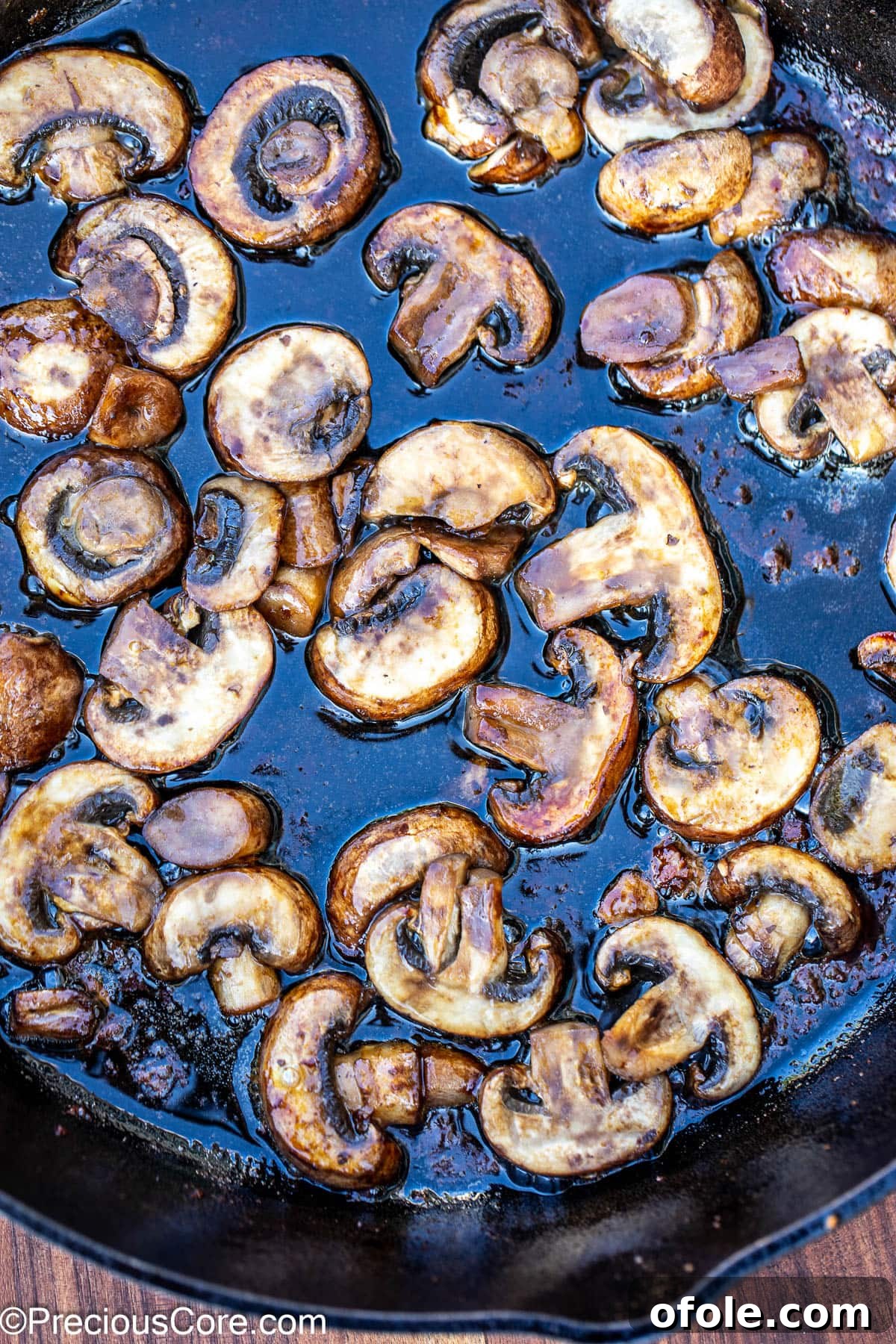 Pan-Seared Pork Tenderloin with Velvety Mushroom Sauce 9 Sautéed mushrooms in a skillet.