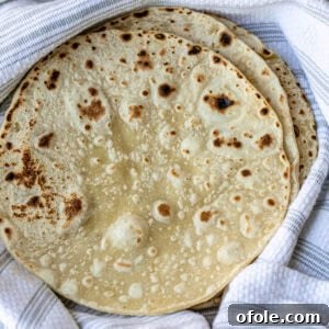 Shawarma Flatbread Delights 13 A freshly cooked piece of soft shawarma bread on a linen cloth.