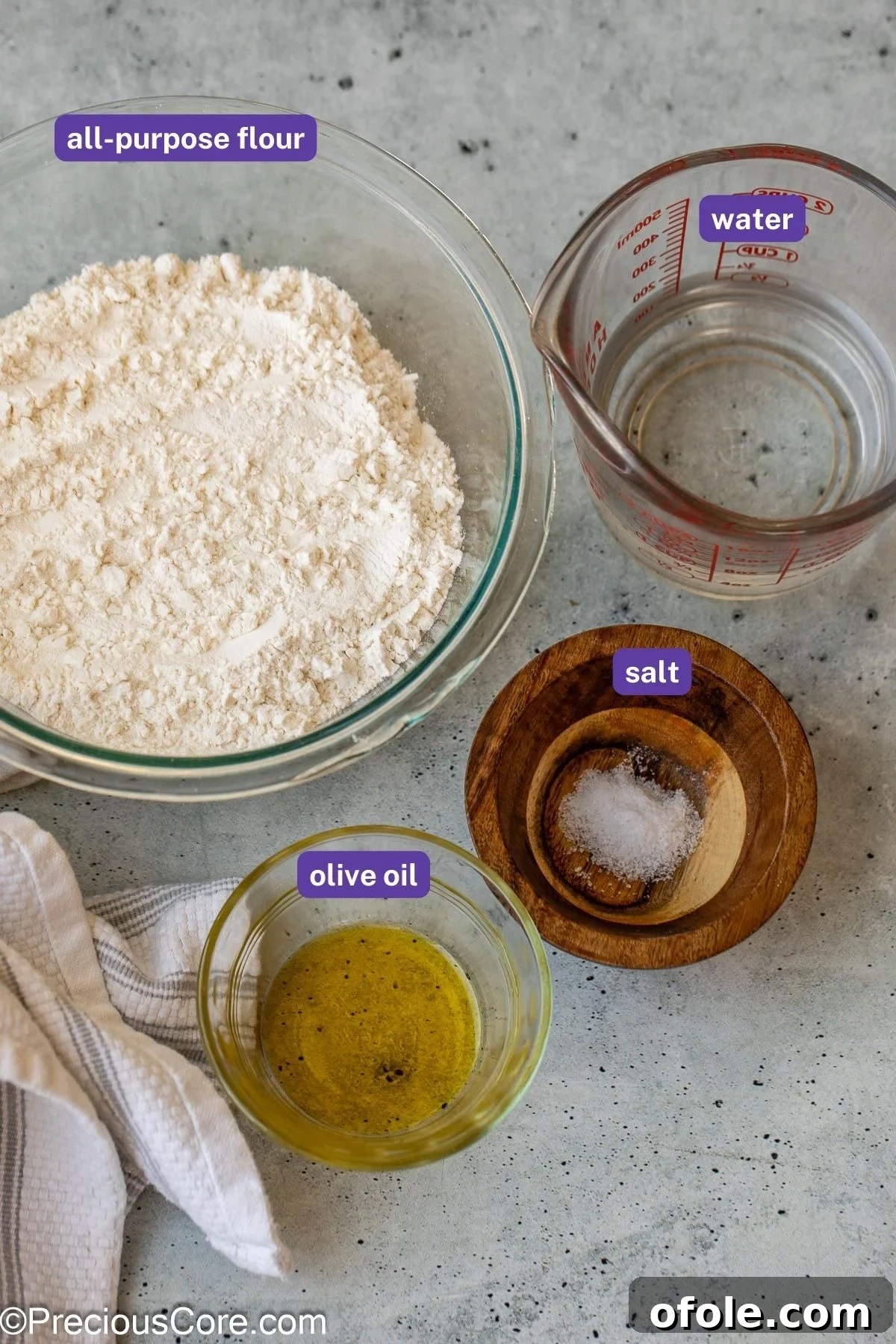 Shawarma Flatbread Delights 5 A collection of measured ingredients, including flour, salt, oil, and water, neatly arranged for making shawarma bread.