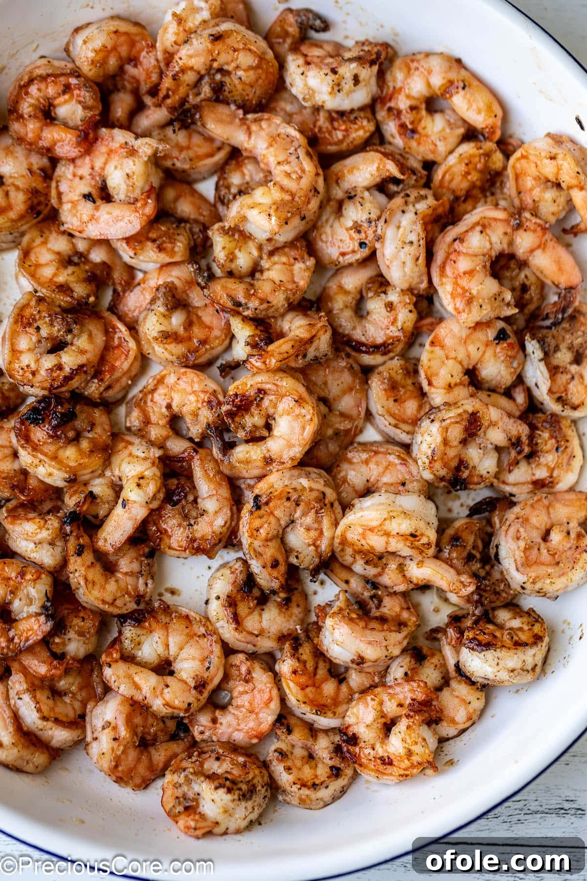 Tropical Mango Prawn Salad 5 Seasoned and perfectly cooked shrimp in a bowl, cooled and ready to be added to the salad.