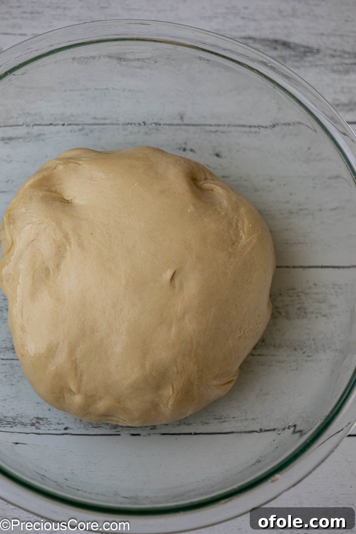 Luscious Strawberry Cinnamon Rolls 10 Cinnamon roll dough placed in a greased bowl before its first rise.