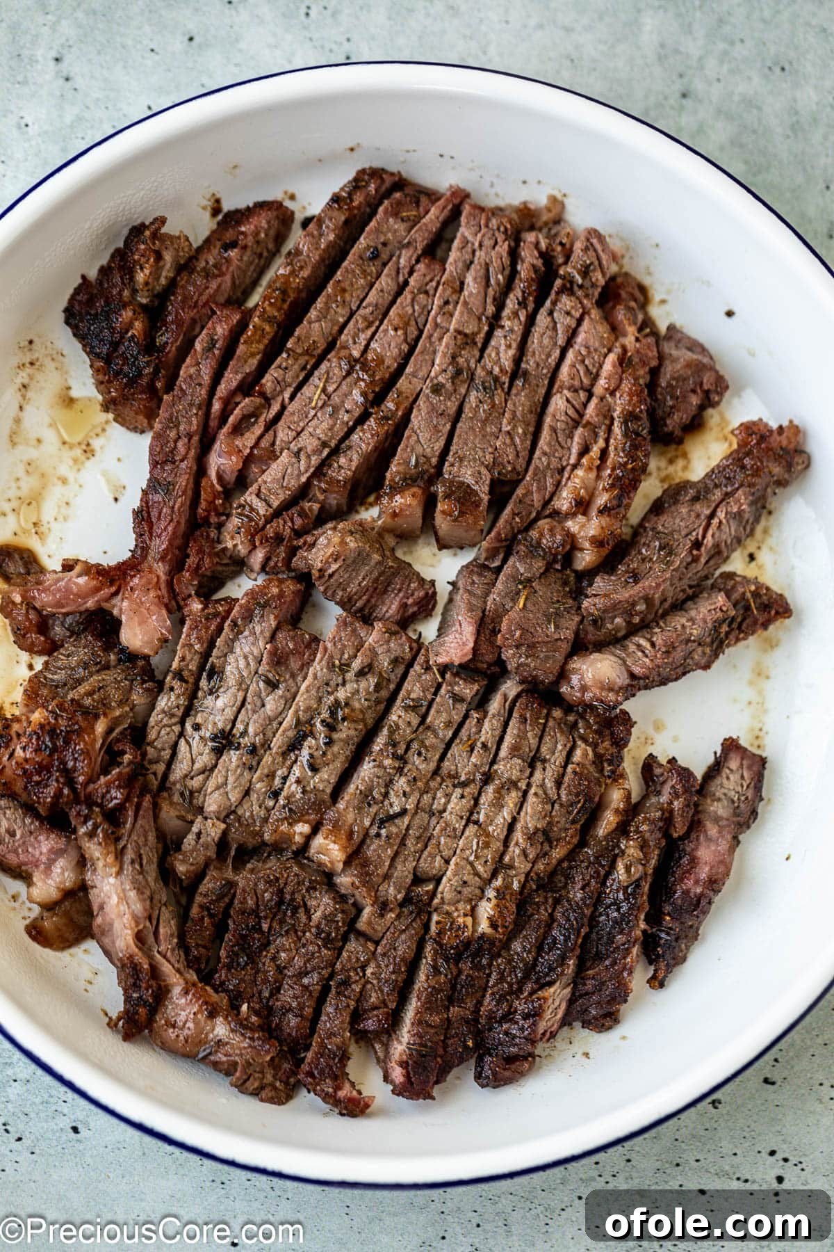 Elevated Ribeye Steak Sandwich 10 Cooked and sliced ribeye steak.
