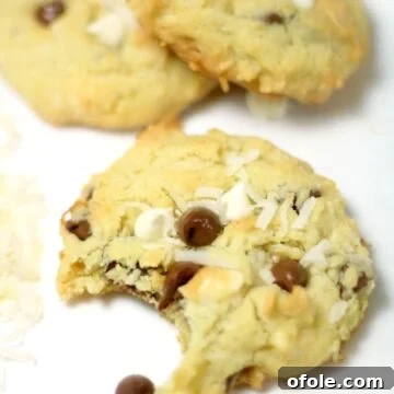 Tropical Coconut Chocolate Chip Cookies 9 Coconut chocolate chip cookie missing a bite.