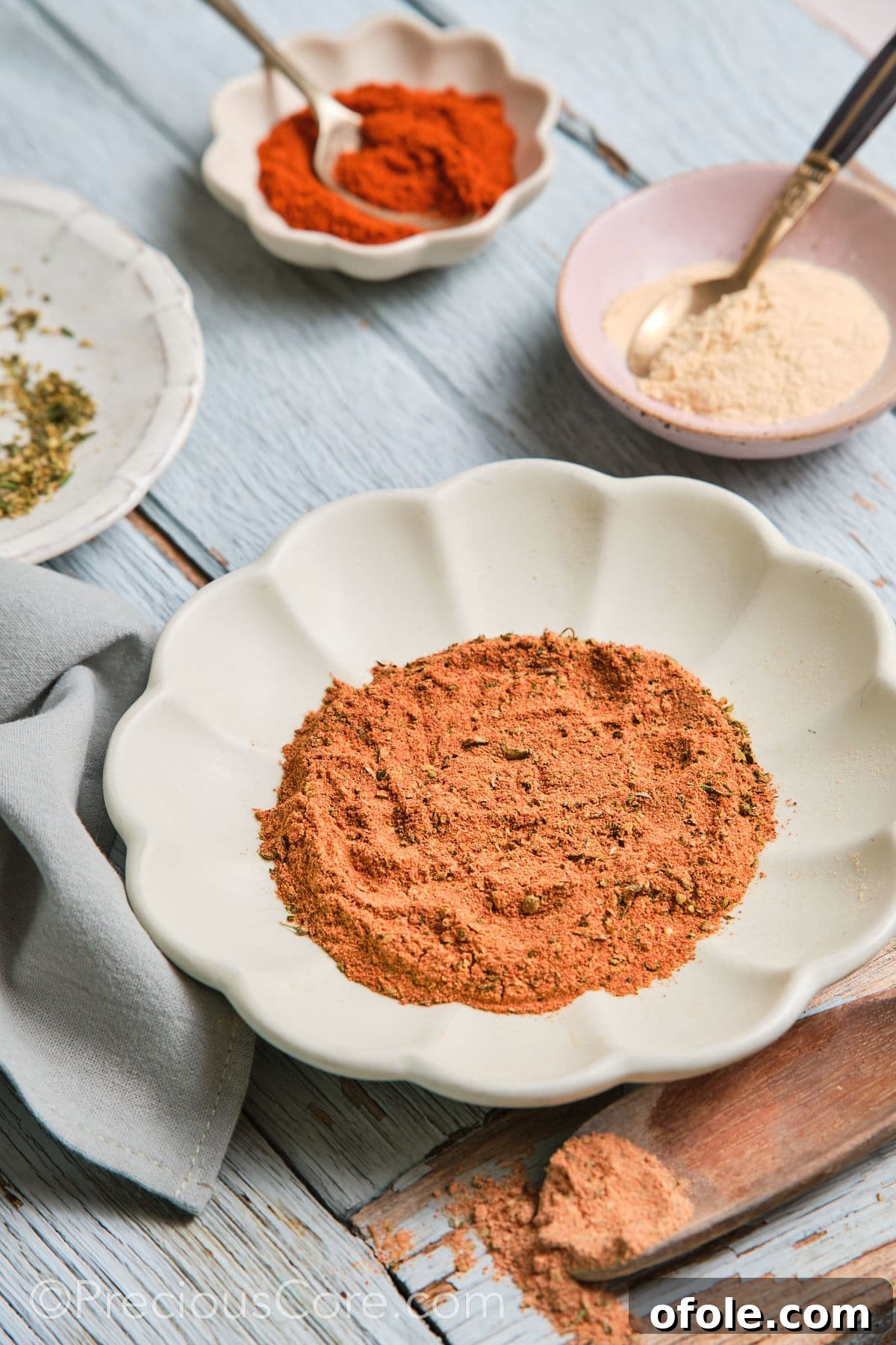 Cajun Flavor Hacks 3 A rustic plate filled with vibrant homemade Cajun seasoning.