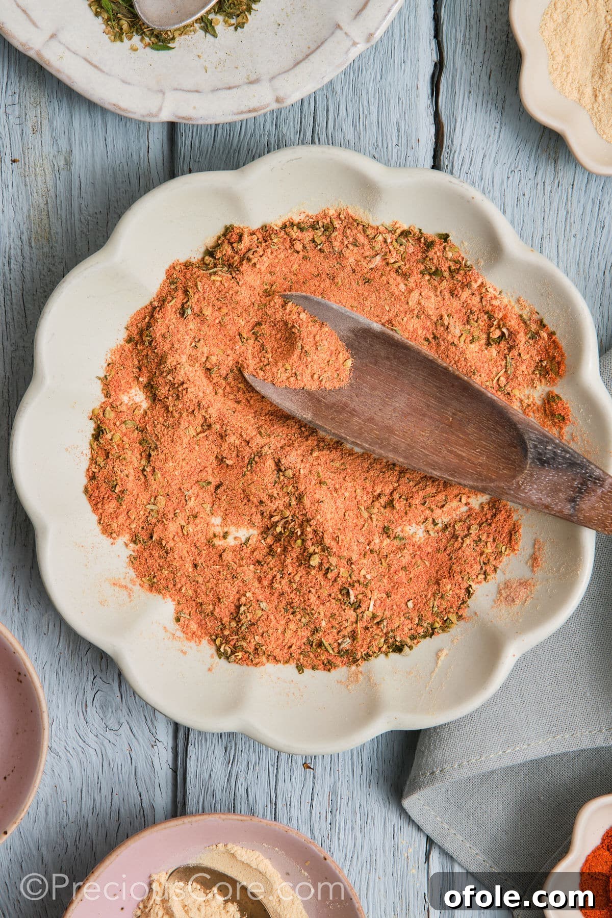Cajun Flavor Hacks 5 Various spices laid out to create a homemade creole seasoning substitute.