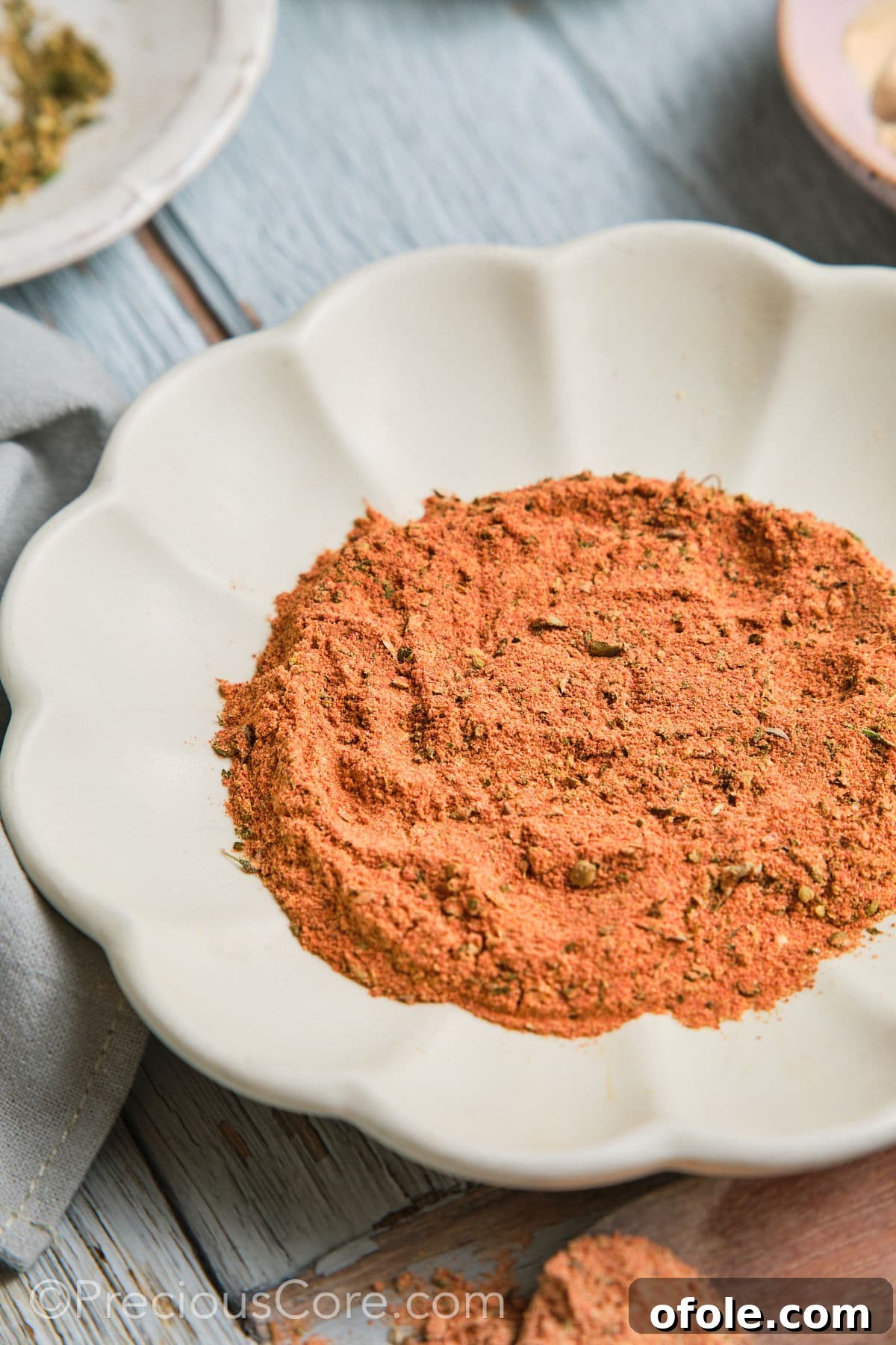 Cajun Flavor Hacks 7 Close-up shot of the vibrant, mixed Cajun seasoning substitute in a small bowl.