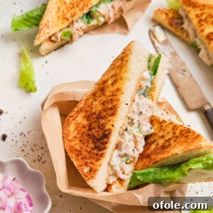 Creamy Chicken Sensation 15 Chicken Mayonnaise Sandwiches cut into triangles.