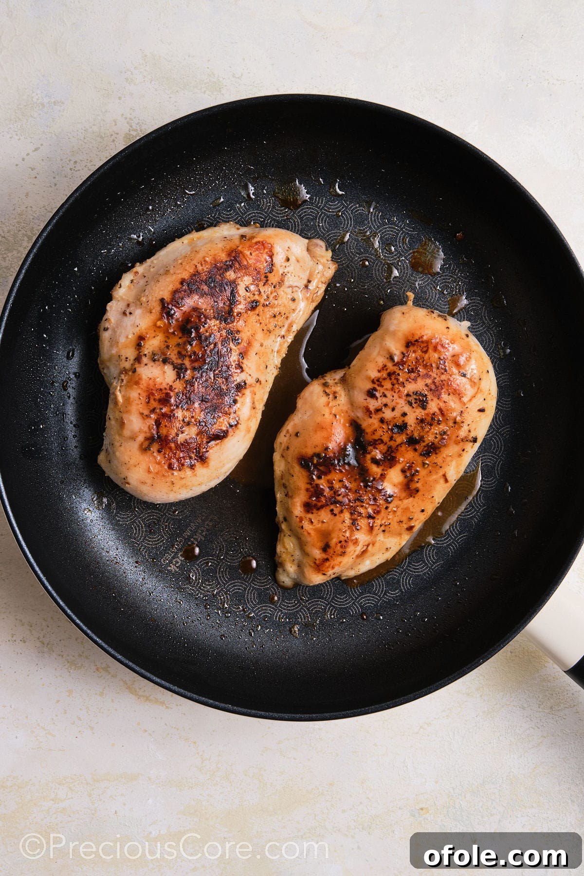 Creamy Chicken Sensation 8 Searing chicken breasts in a skillet.