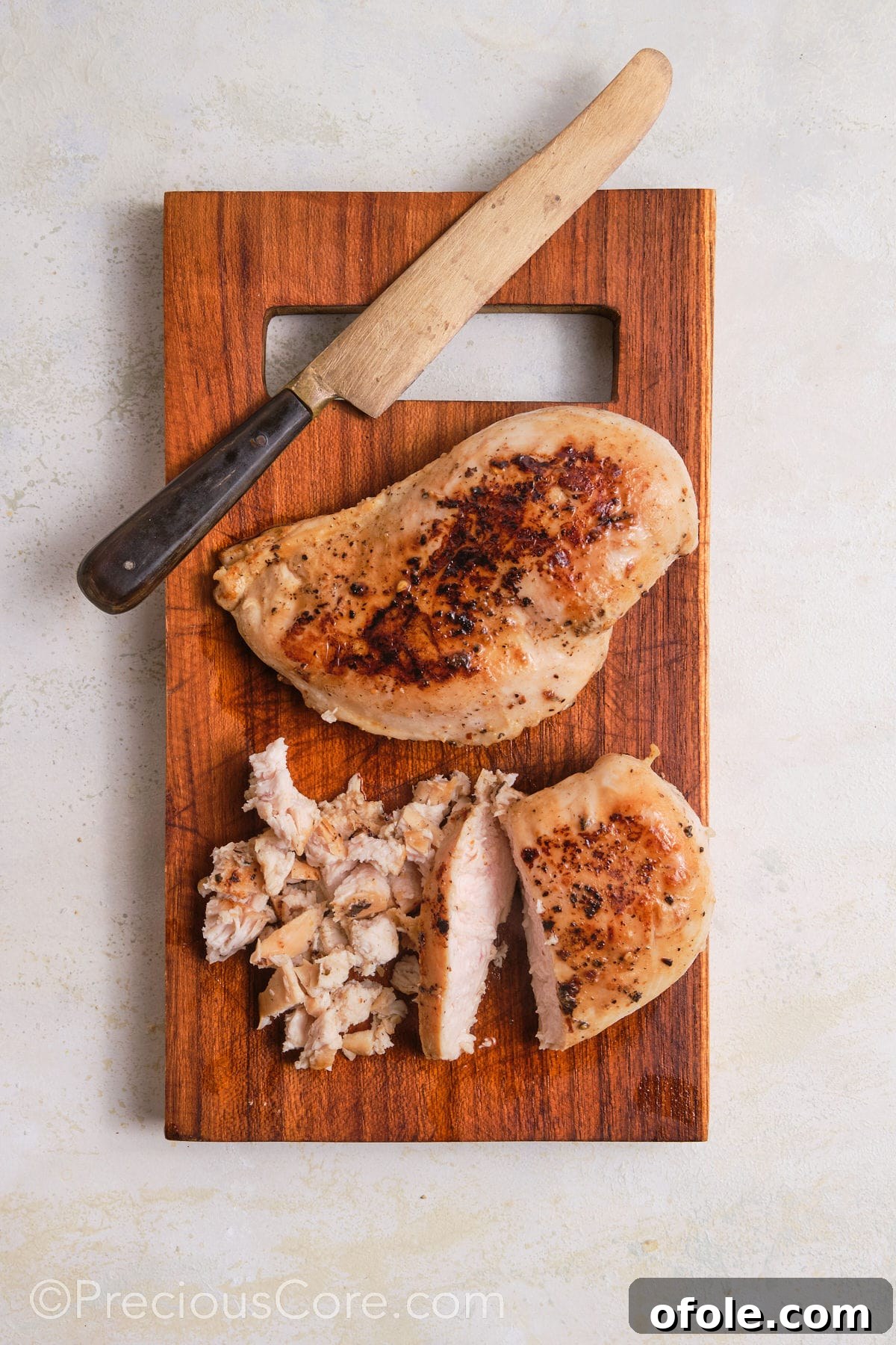 Creamy Chicken Sensation 9 Dicing chicken breasts into small pieces.