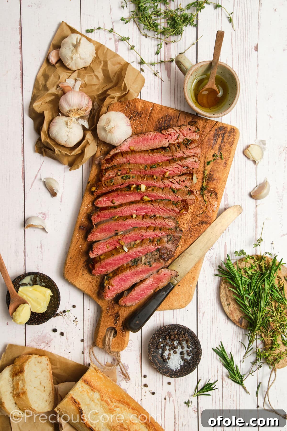 Flank steak cut against the grain, showing the shortened muscle fibers for tenderness.