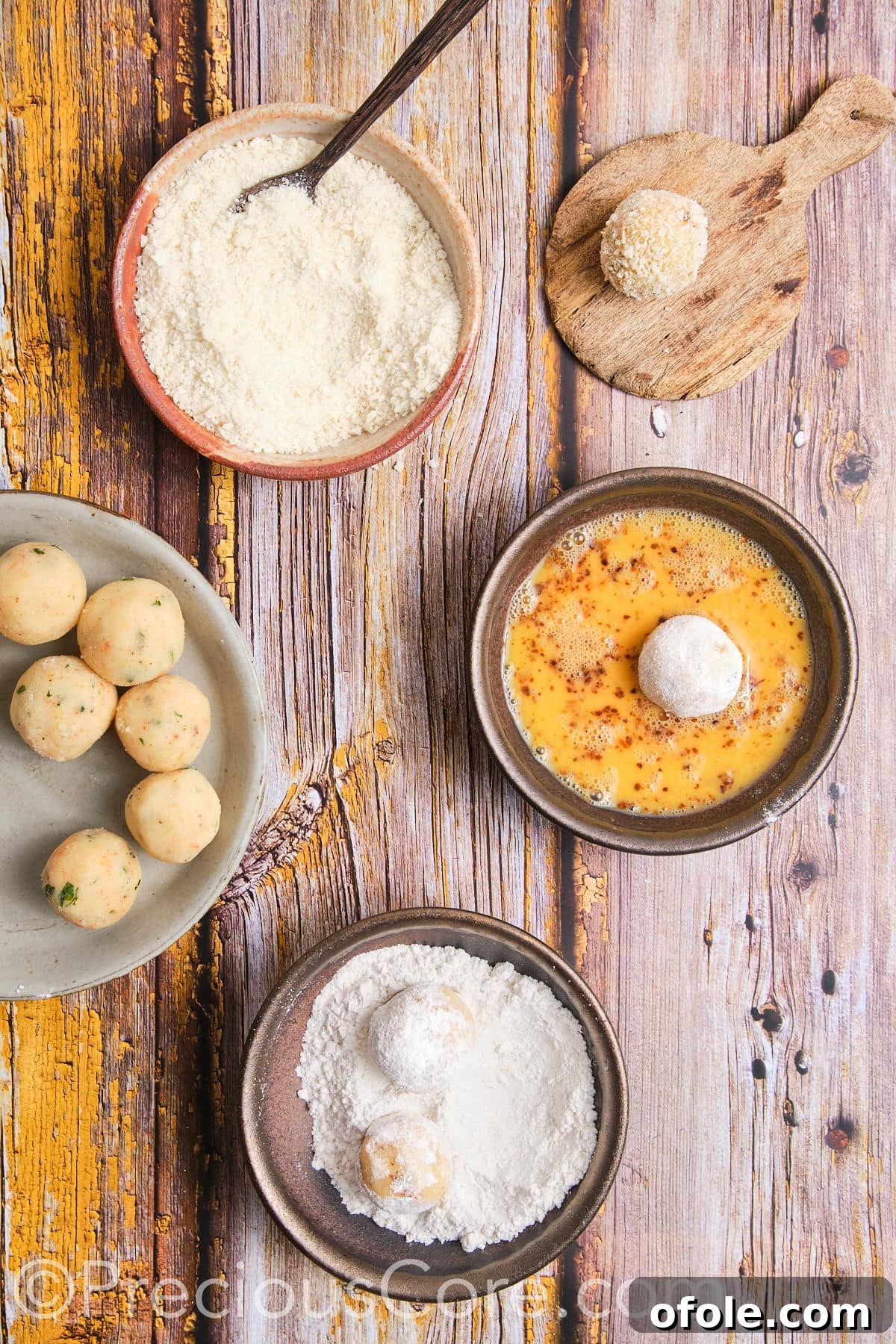 Three separate plates showing the egg mixture, flour, and breadcrumbs, set up for coating the potato cheese balls.