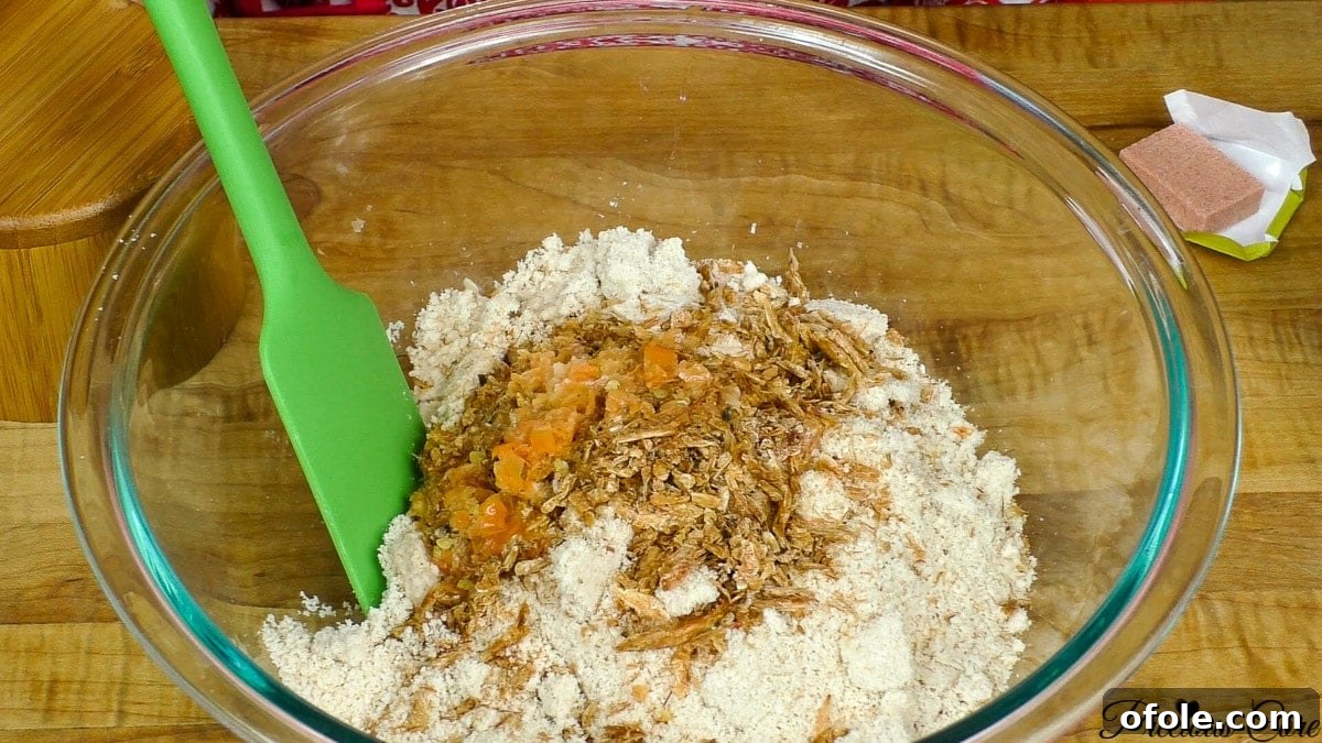 Step-by-step image of egusi seeds being ground into a fine powder, highlighting the dry blending process