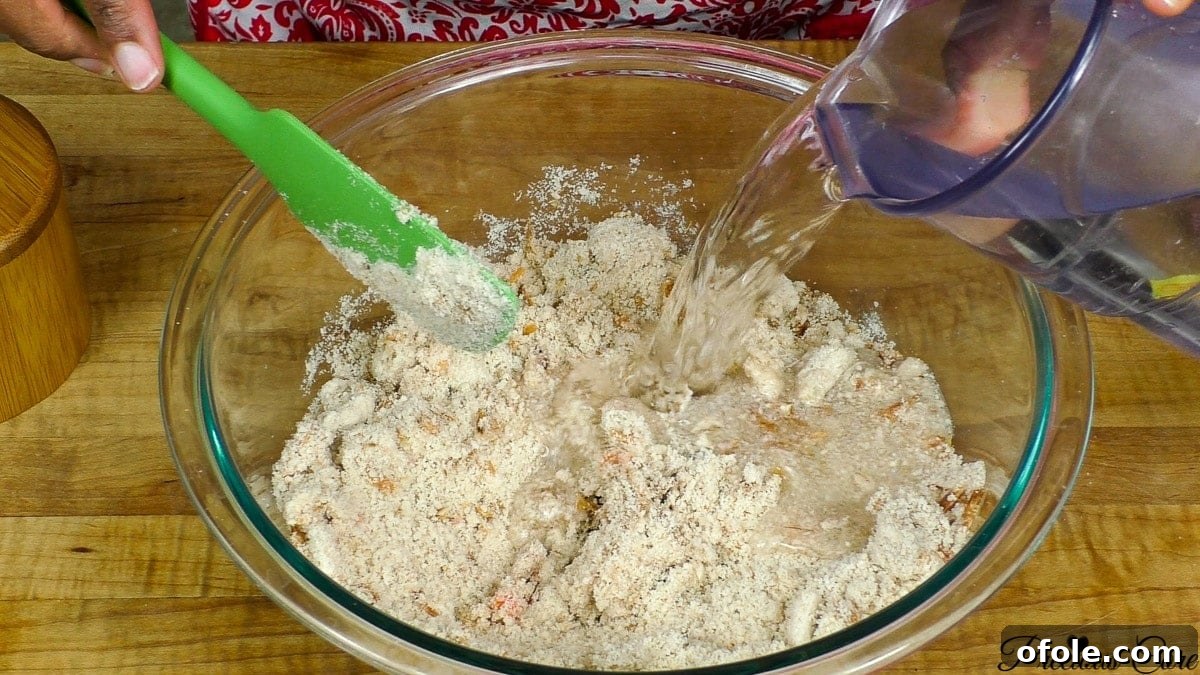 Egusi paste mixture in a bowl, showing the consistency before adding other ingredients