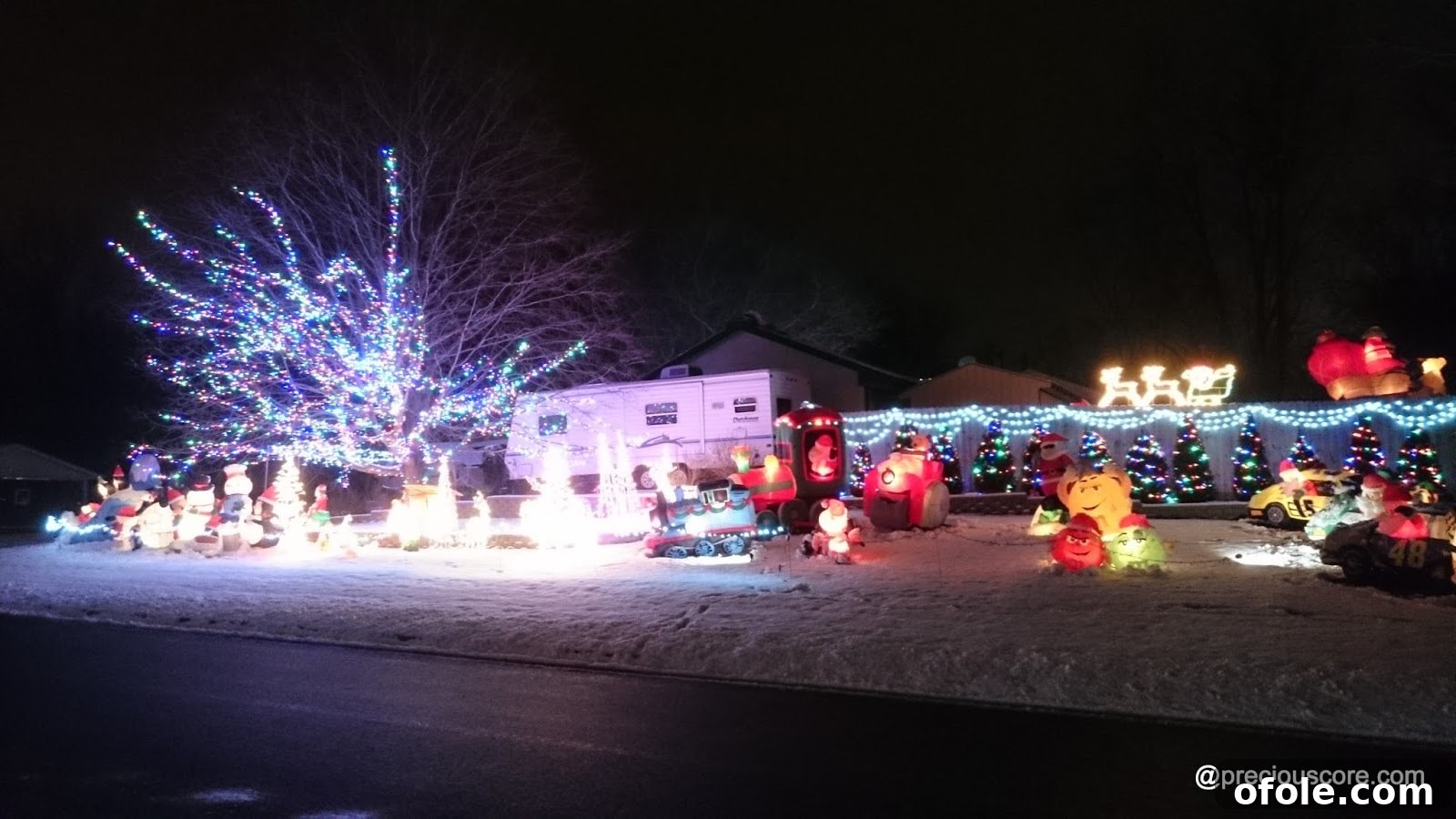 Christmas Lights and All Things Merry 11 Extravagant Christmas light display on a house