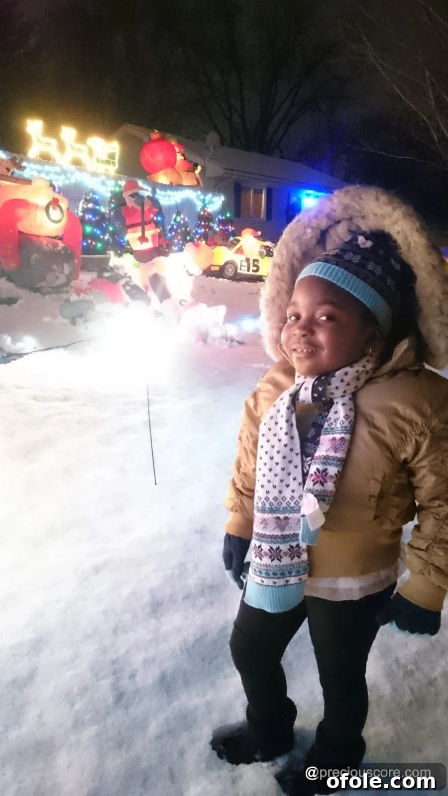 Christmas Lights and Holiday Sparkle 17 Children posing happily with bright holiday lights in background