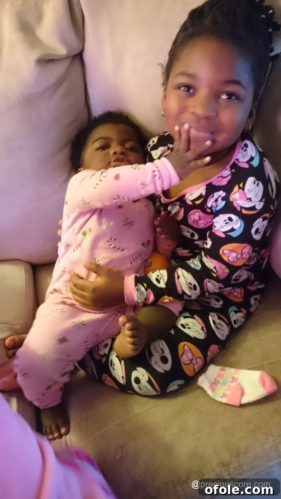 Christmas Lights and Holiday Sparkle 19 Children cuddled up in pyjamas, sleeping or relaxing