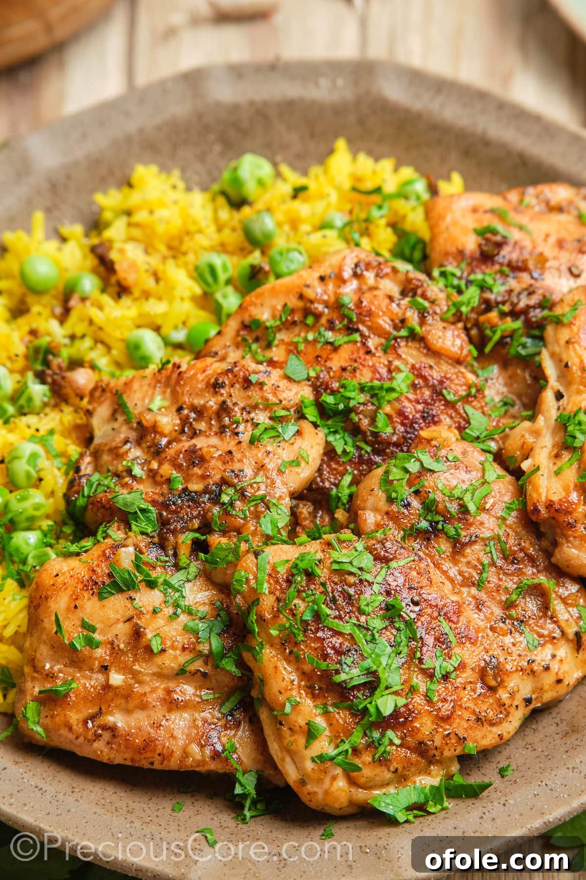Juicy Skillet Chicken Thighs 17 A close-up shot of perfectly cooked, golden-brown pan-seared boneless chicken thighs, showing delicious detail.