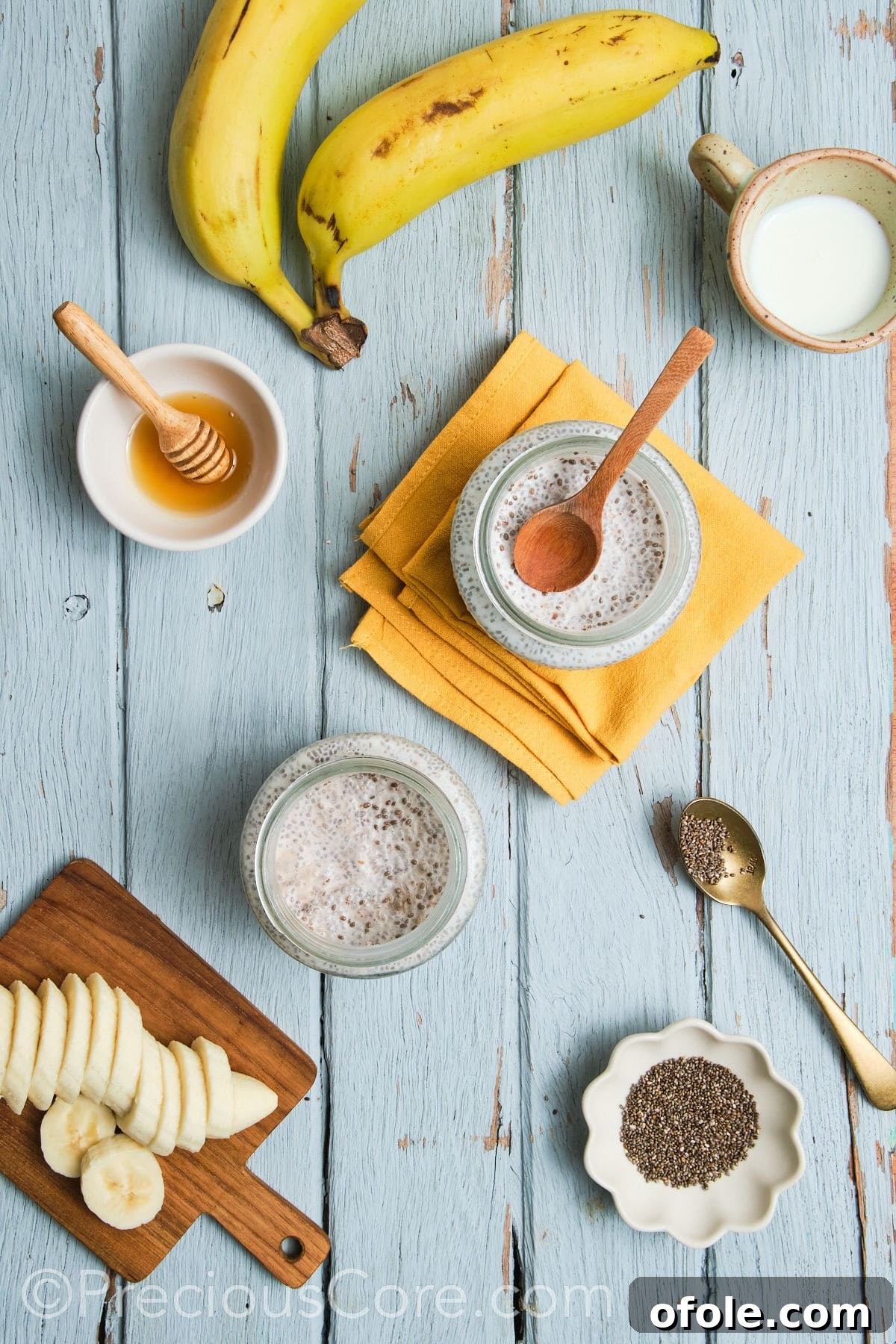 Close-up of set banana chia pudding in a glass jar, showing its thick texture.