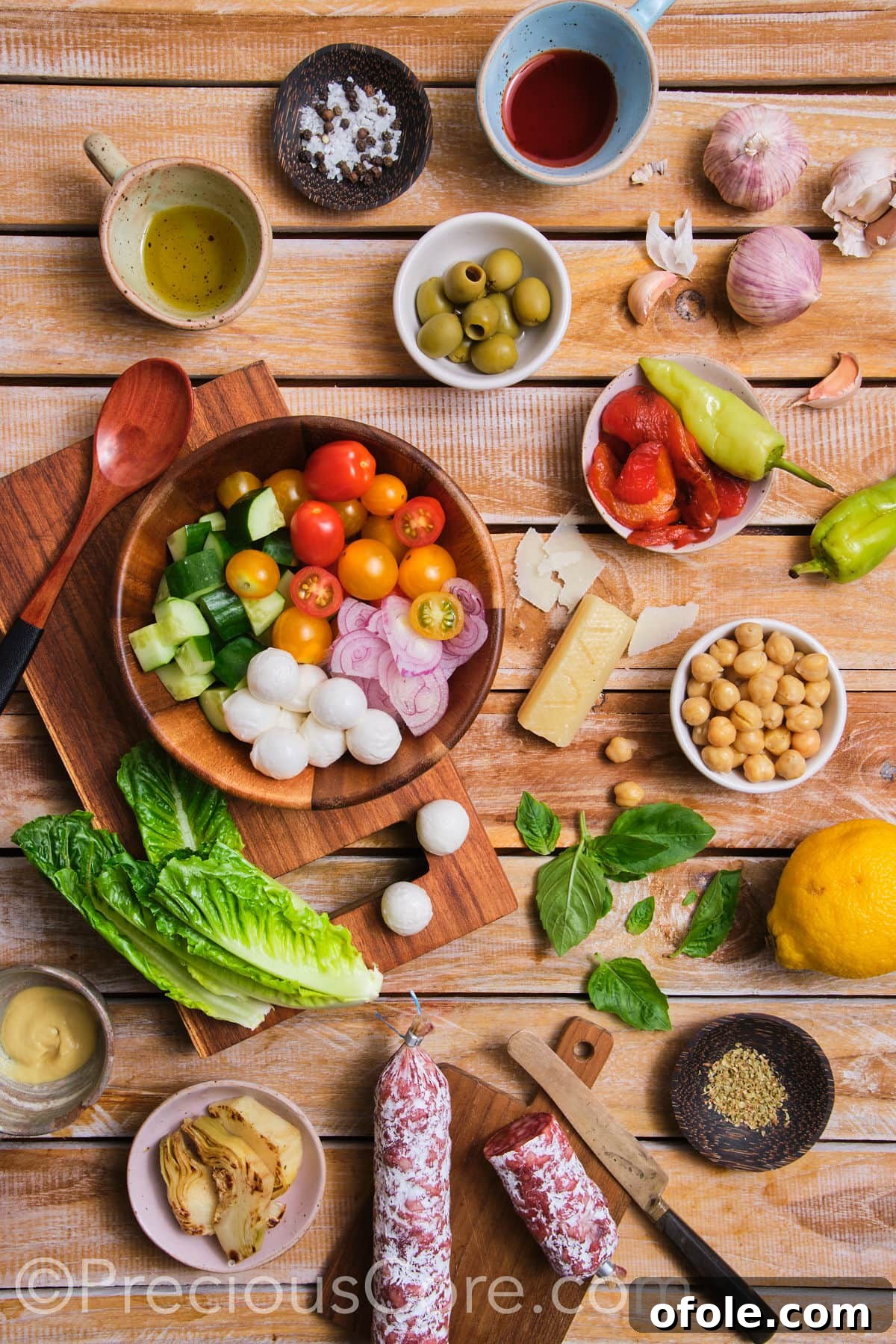 Antipasto Chopped Salad 5 Individual ingredients laid out for Italian Chopped Salad preparation.