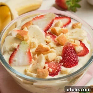 Strawberry Banana Pudding in a clear trifle dish.