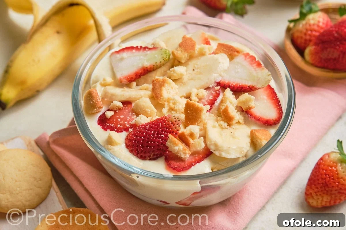 Dreamy Strawberry Banana Pudding 4 A beautiful bowl of homemade strawberry banana pudding, ready to be served, highlighting its smooth texture and fresh fruit.