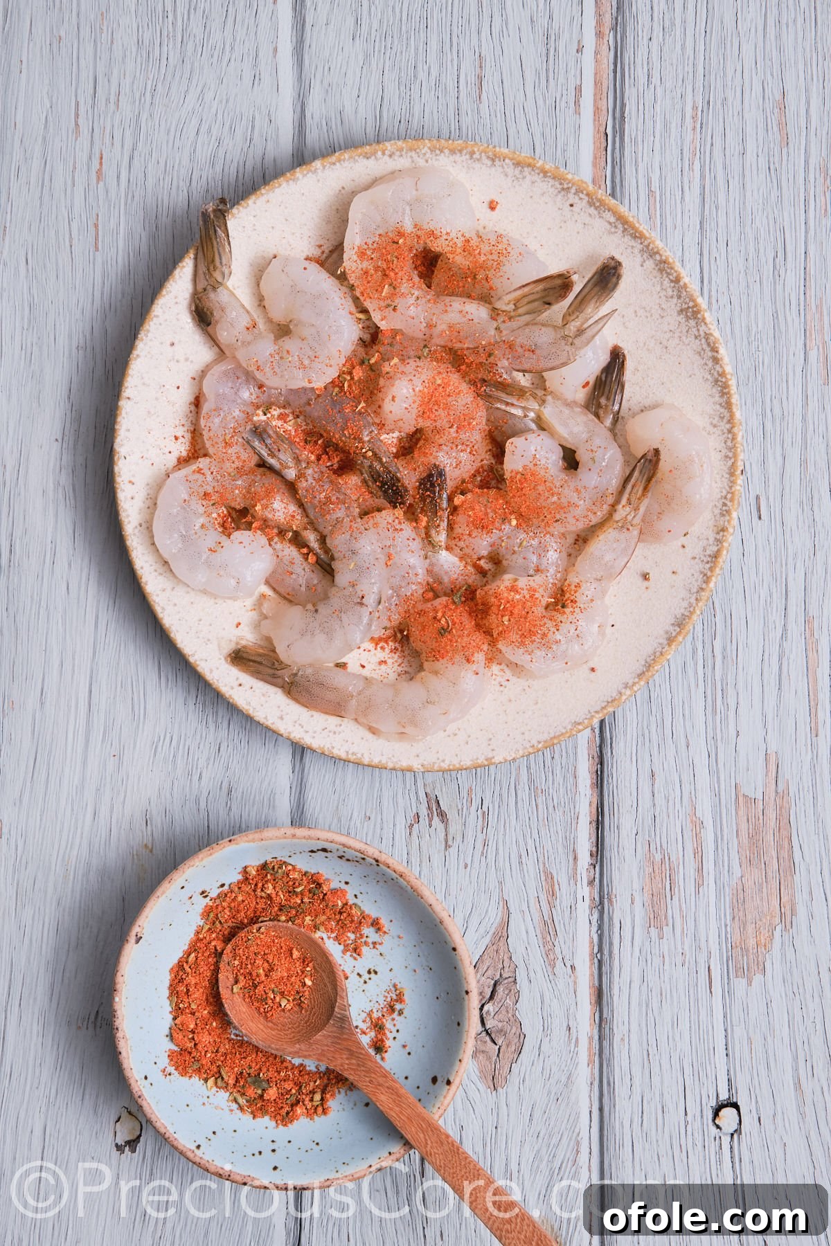 Cajun Shrimp Deviled Eggs 15 Seasoning shrimp on a plate.