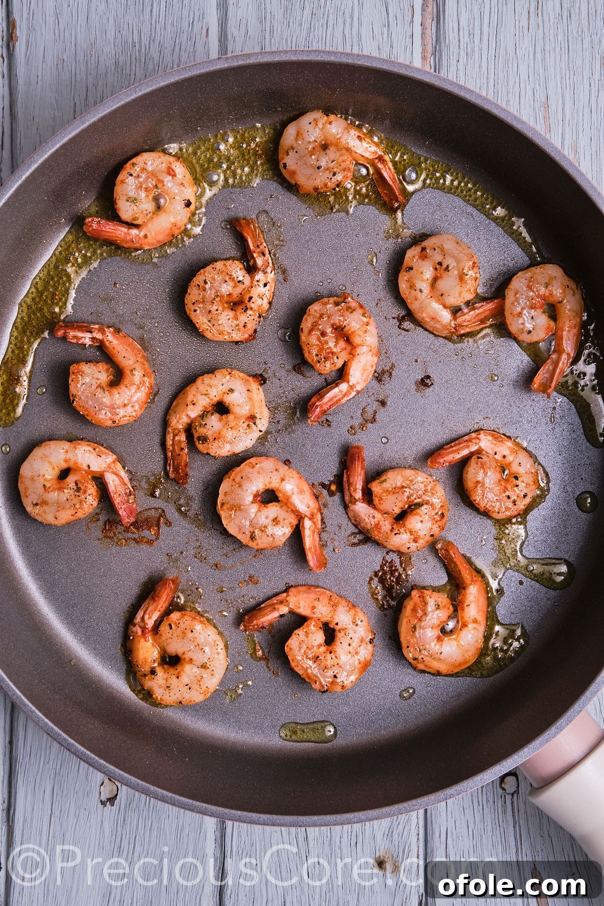 Cajun Shrimp Deviled Eggs 17 sauteed shrimp in a pan.