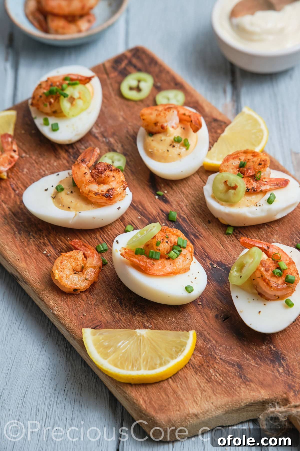 Cajun Shrimp Deviled Eggs 3 Side shot of delicious-looking deviled eggs topped with shrimp.