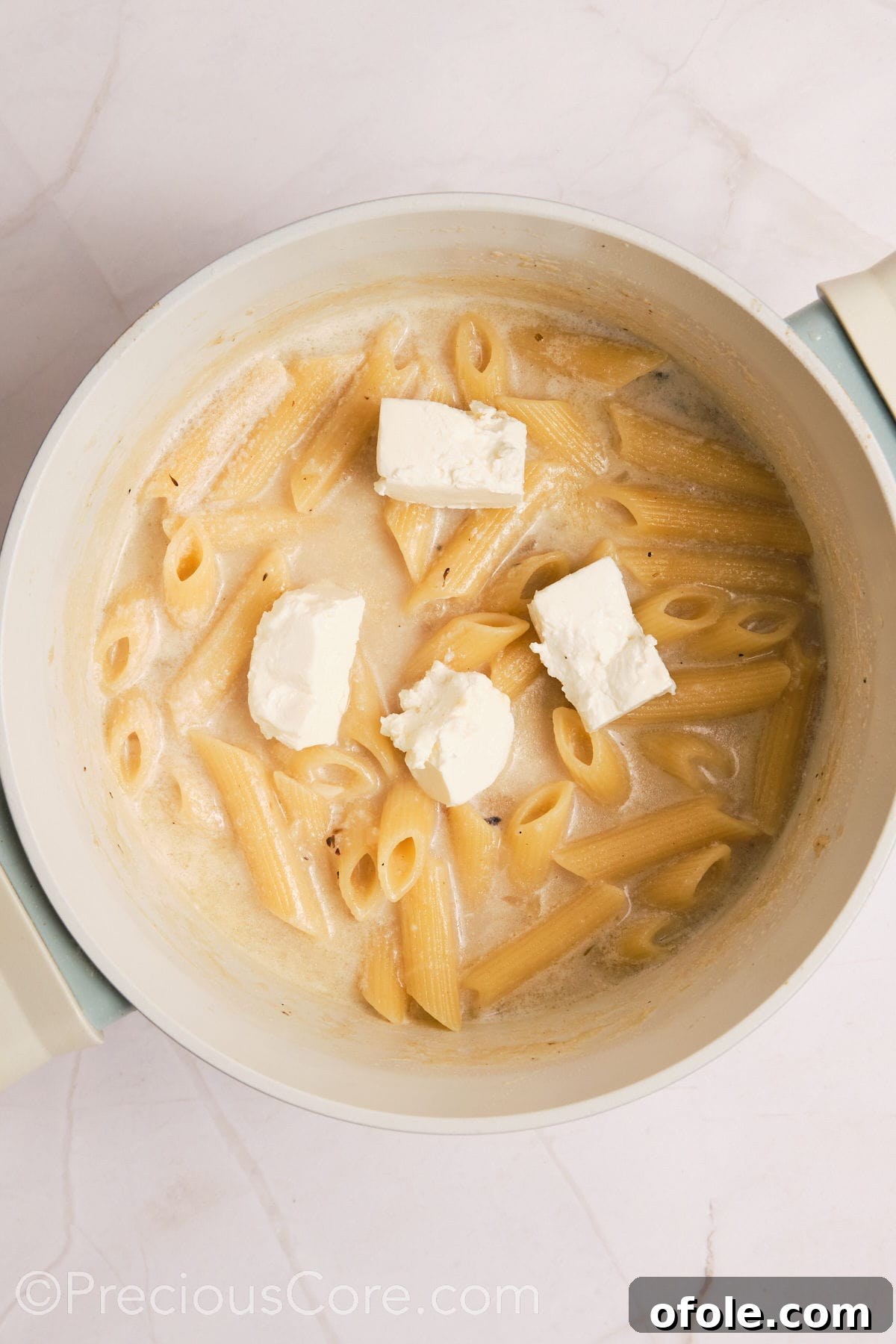 One Pot Wonder Creamy Chicken Pasta 14 Cream cheese added to pasta.