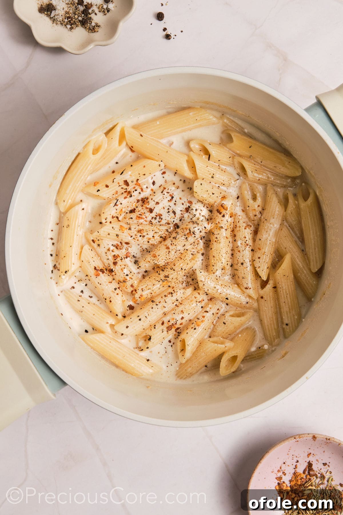 One Pot Wonder Creamy Chicken Pasta 15 Seasoning added to one pot creamy pasta.