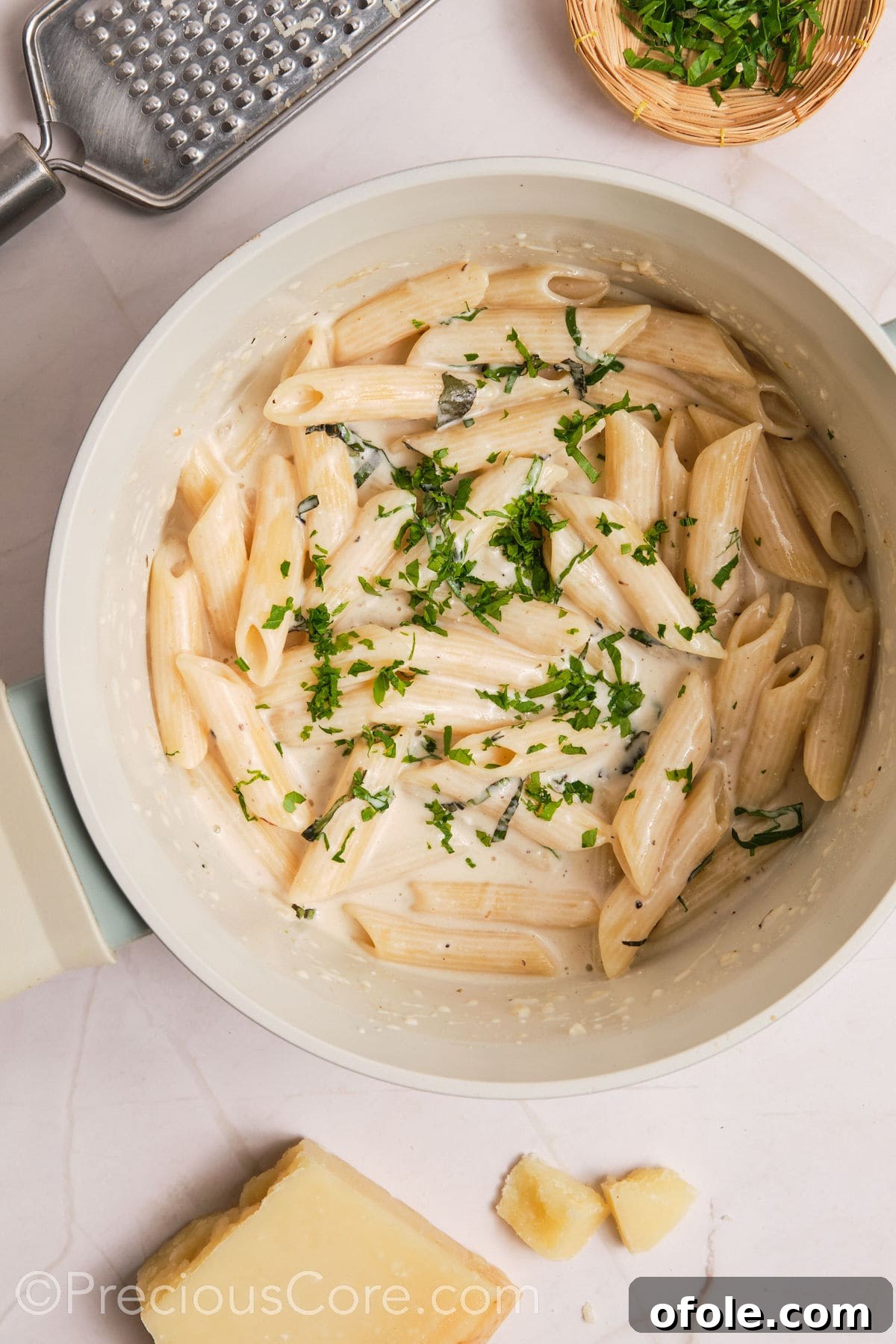 One Pot Wonder Creamy Chicken Pasta 17 Basil and parsley added to creamy pasta.