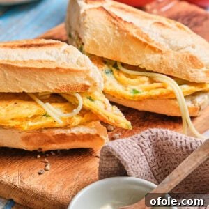 Cameroon's Signature Spaghetti Omelette Sandwich 14 French baguette stuffed with spaghetti omelette and cut in half.