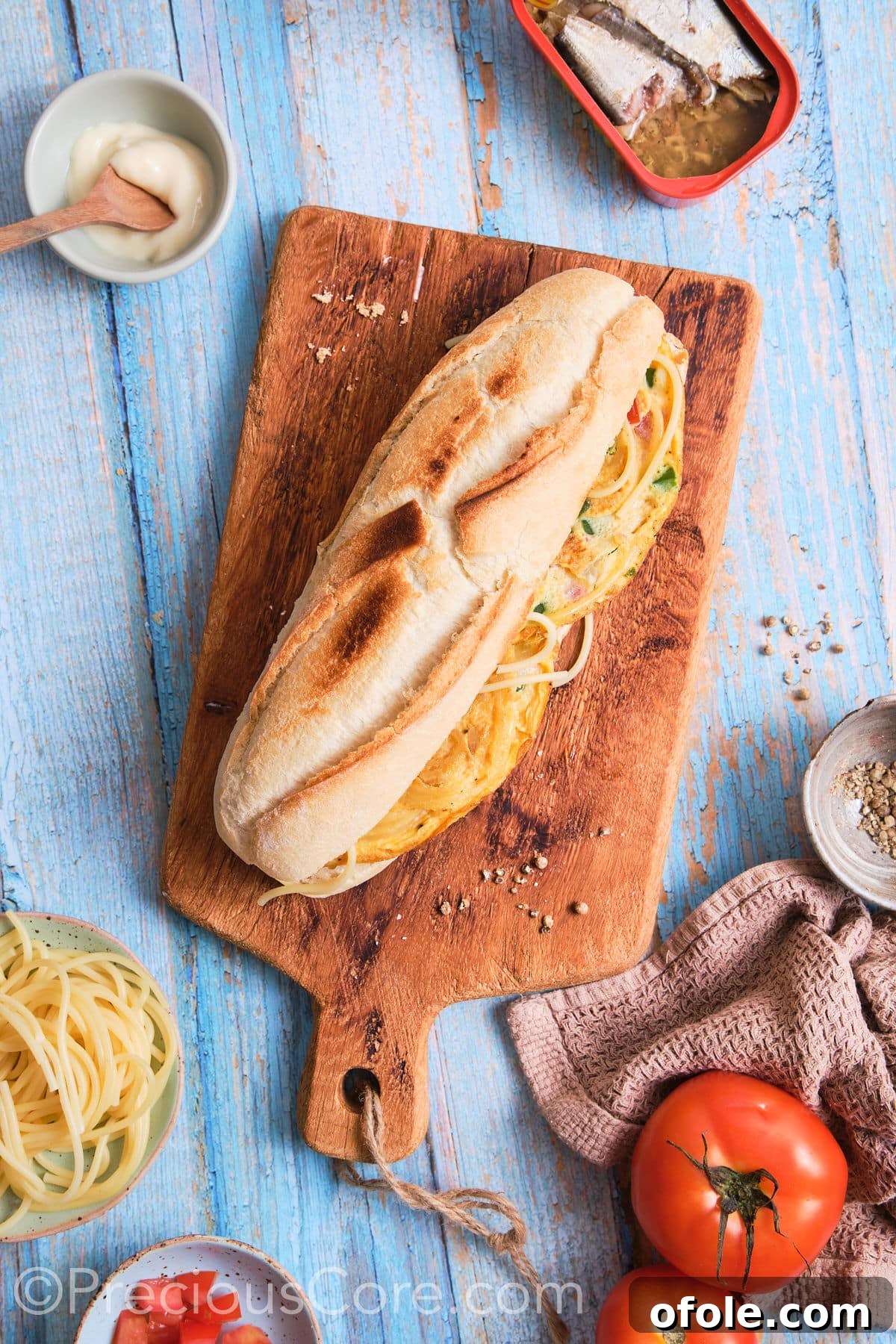 Cameroon's Signature Spaghetti Omelette Sandwich 5 A perfectly assembled and closed spaghetti omelette sandwich, ready to be enjoyed.