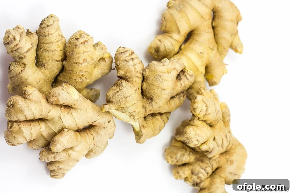 Zesty Ginger Brew 4 Close-up of fresh ginger root, highlighting its natural texture, a key ingredient for a healthy ginger drink.