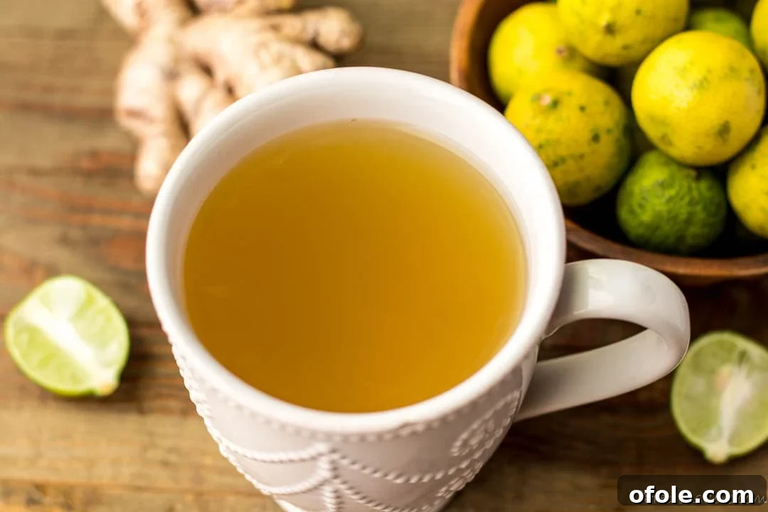 Zesty Ginger Brew 10 A tranquil landscape image featuring a mug of ginger tea placed outdoors, symbolizing natural wellness and relaxation.