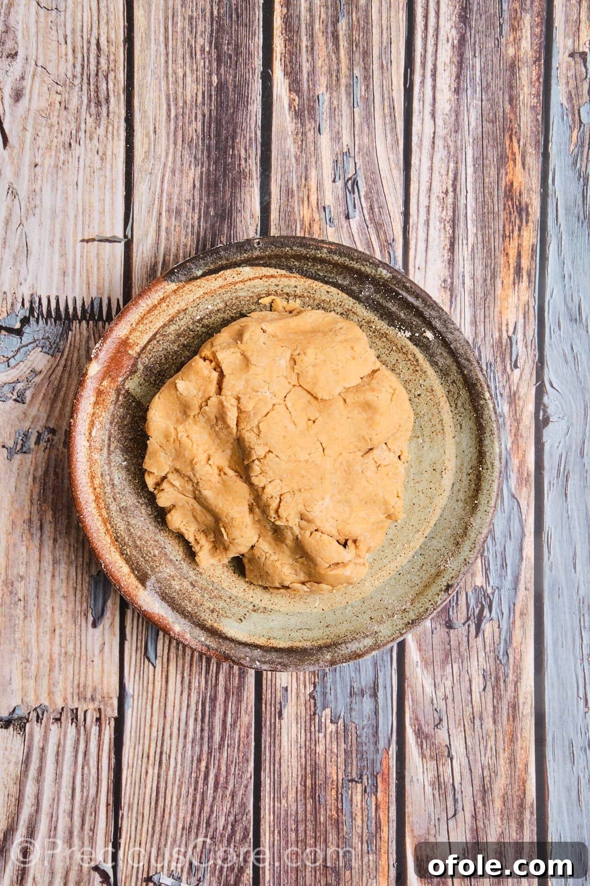 Spiced Sweet Potato Scones 12 A lightly mixed sweet potato scone dough, still somewhat crumbly but beginning to come together, sits in a mixing bowl.
