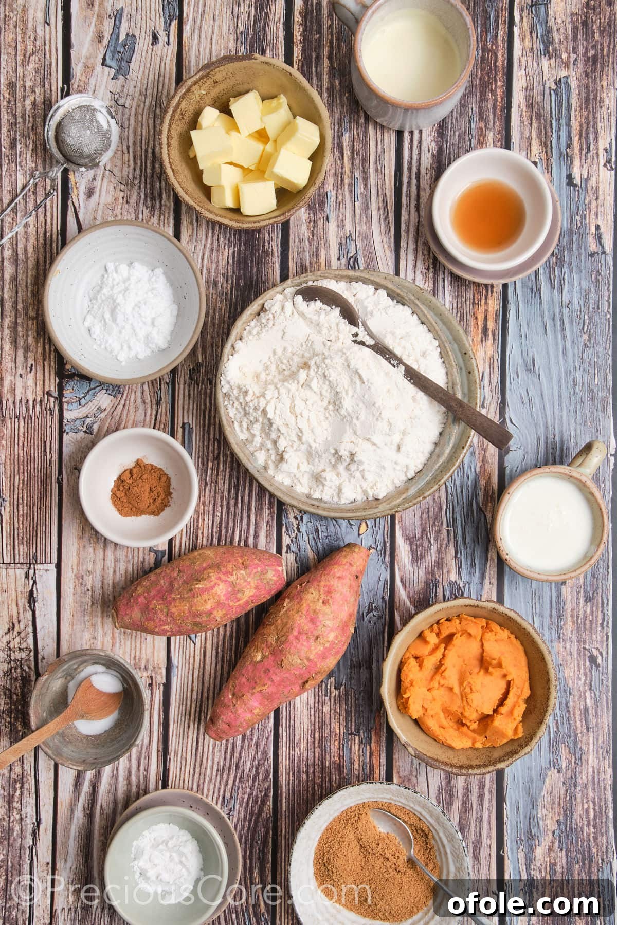 Golden Sweet Potato Scones 6 A curated selection of fresh ingredients, including sweet potatoes, flour, butter, and spices, meticulously laid out for baking scones.