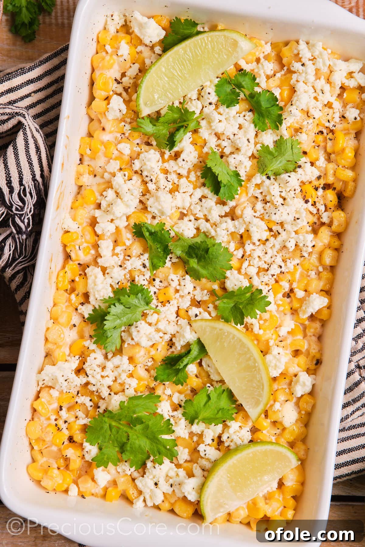 Fiesta Street Corn Bake 10 A stunning overhead shot of the Mexican street corn casserole, served in a classic white baking dish, perfect for sharing.