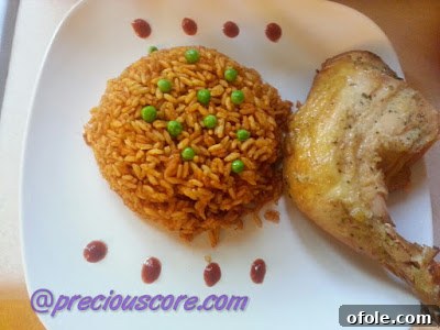 Speedy & Savory: 30-Minute Jollof Rice Quick 30-Minute Jollof Rice in a pot