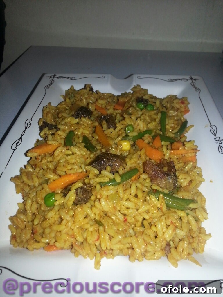Taste of Cameroon: Traditional Jollof Rice Authentic Cameroonian Jollof Rice serving