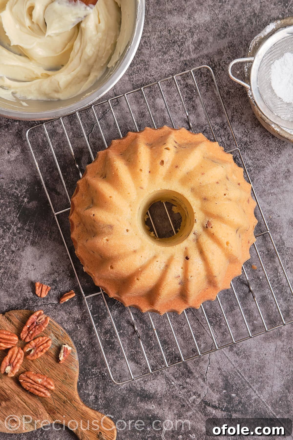 Southern Butter Pecan Pound Cake 13 The baked pound cake cooling on a wire rack.