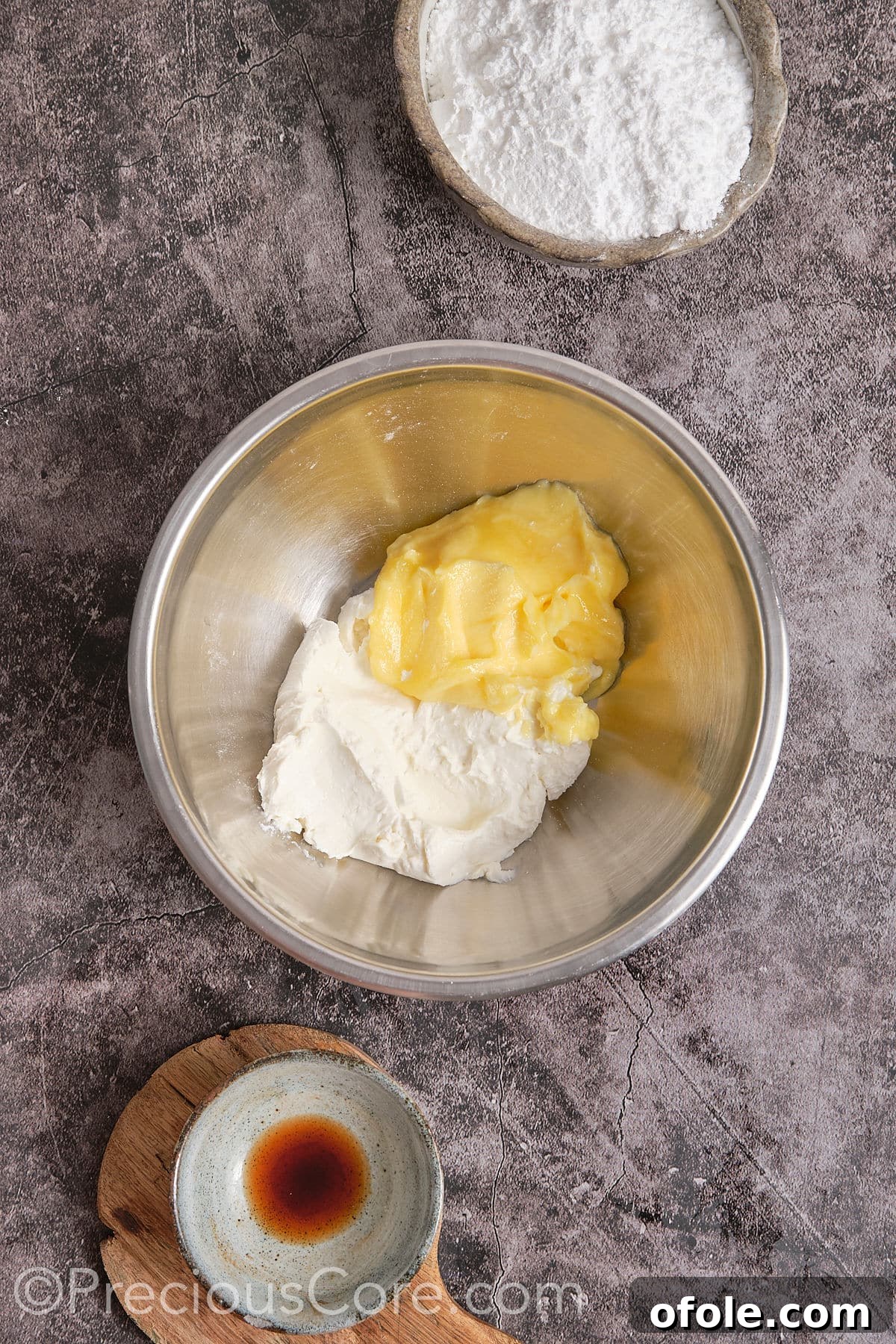 Southern Butter Pecan Pound Cake 14 Softened cream cheese and butter in a mixing bowl for frosting preparation.