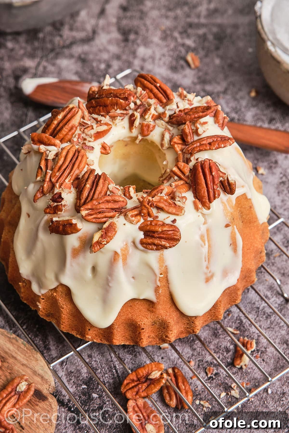 Southern Butter Pecan Pound Cake 3 Pound cake generously covered with a creamy, white frosting and scattered pecans.
