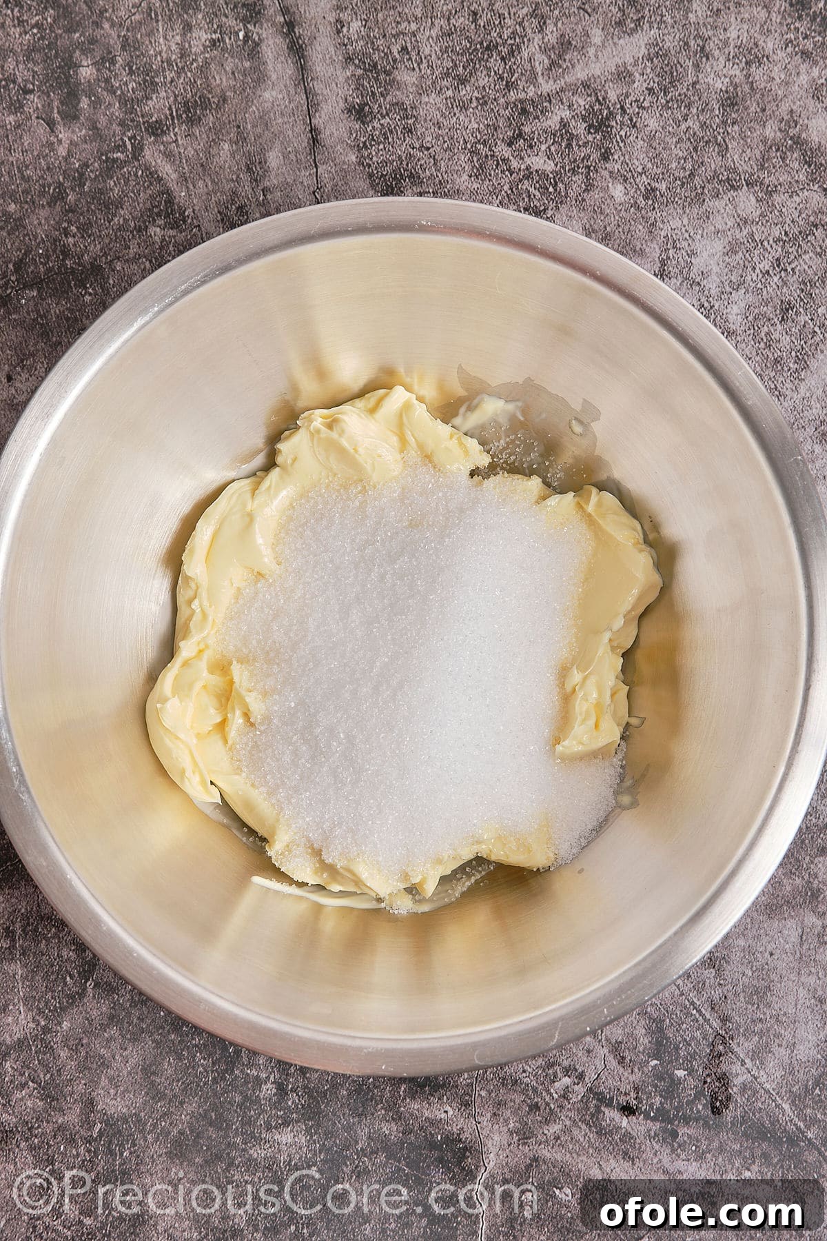 Southern Butter Pecan Pound Cake 6 Softened butter and granulated sugar being creamed together in a large mixing bowl.