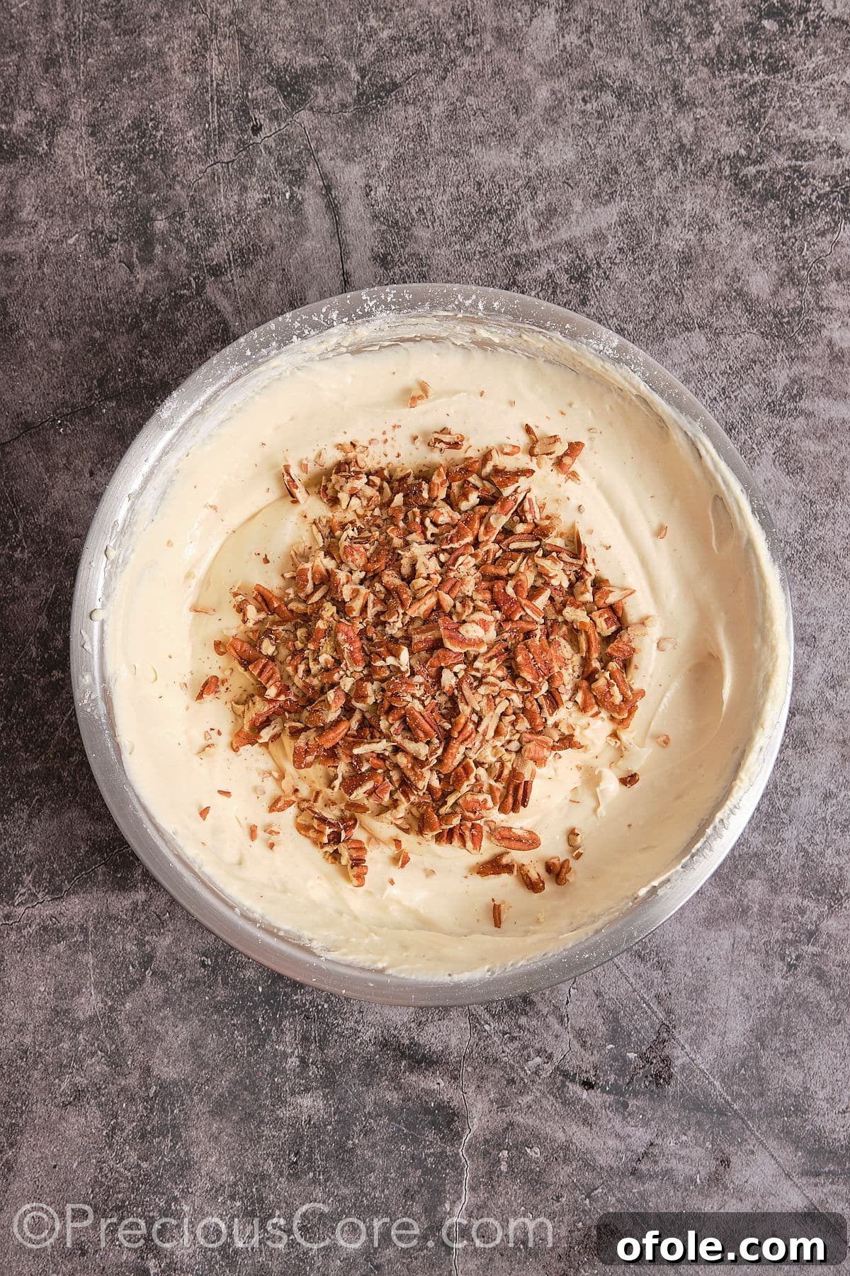 Southern Butter Pecan Pound Cake 10 Folding chopped pecans into the cake batter.